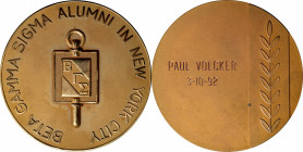 Beta Gamma Sigma Alumni in New York City Award Medal. Bronze. Awarded to Paul A. Volcker, March 10, 1992. Mint State.
71.5 mm. Obv: Symbol of the fra...