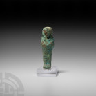 Egyptian Glazed Shabti of the God's Wife of Amun Adorer of the God Amun Qedmeret Third Intermediate Period, 22nd Dynasty, 945-720 B.C. A glazed compos...