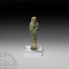 Egyptian Glazed Shabti of Pa-di-Osiris Born of the Lady of the House of Isis 30th Dynasty-Ptolemaic Period, circa 380-31 B.C. A glazed shabti with cro...