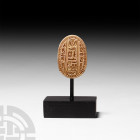Egyptian Scarab with Hieroglyphs Second Intermediate Period, 1664-1569 B.C. A stone scarab with stylised anatomical detailing to the head and legs, sl...