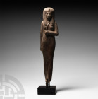 Egyptian Wooden Princess Figurine Early New Kingdom, 1569-1480 B.C. A carved wooden figure of a princess advancing, wearing a Broad Collar, tripartite...