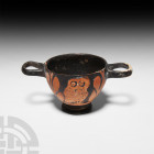 Greek Red Figure Skyphos with Owls 5th-4th century B.C. A terracotta red figure skyphos with carinated body, an owl standing facing, framed by olive o...