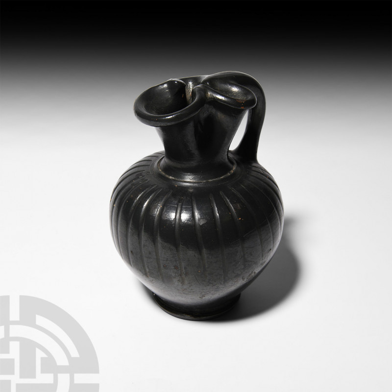 Greek South Italian Black-Glazed Trefoil Oinochoe Circa 4th-3rd century B.C. A b...