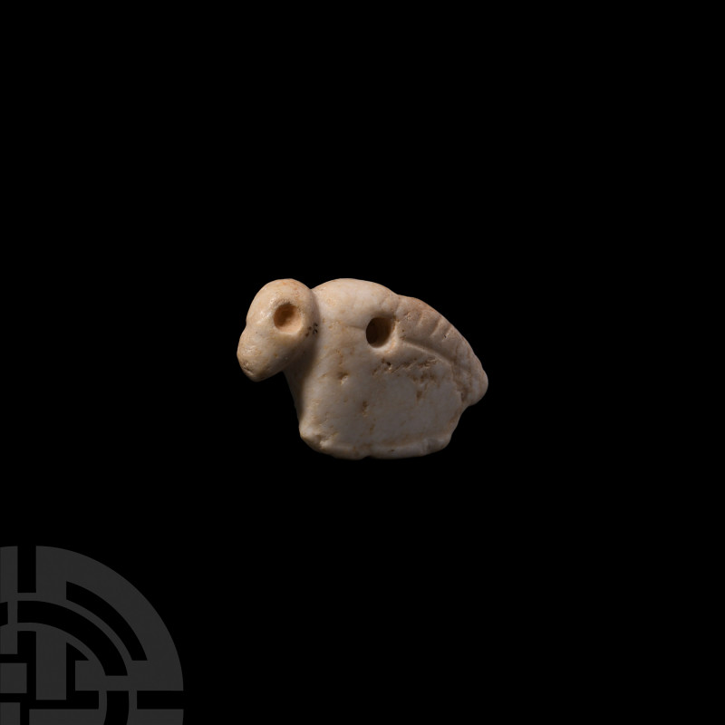 Jemdet Nasr Type Amuletic Bird Pendant 3rd-2nd millennium B.C. A stylised marble...