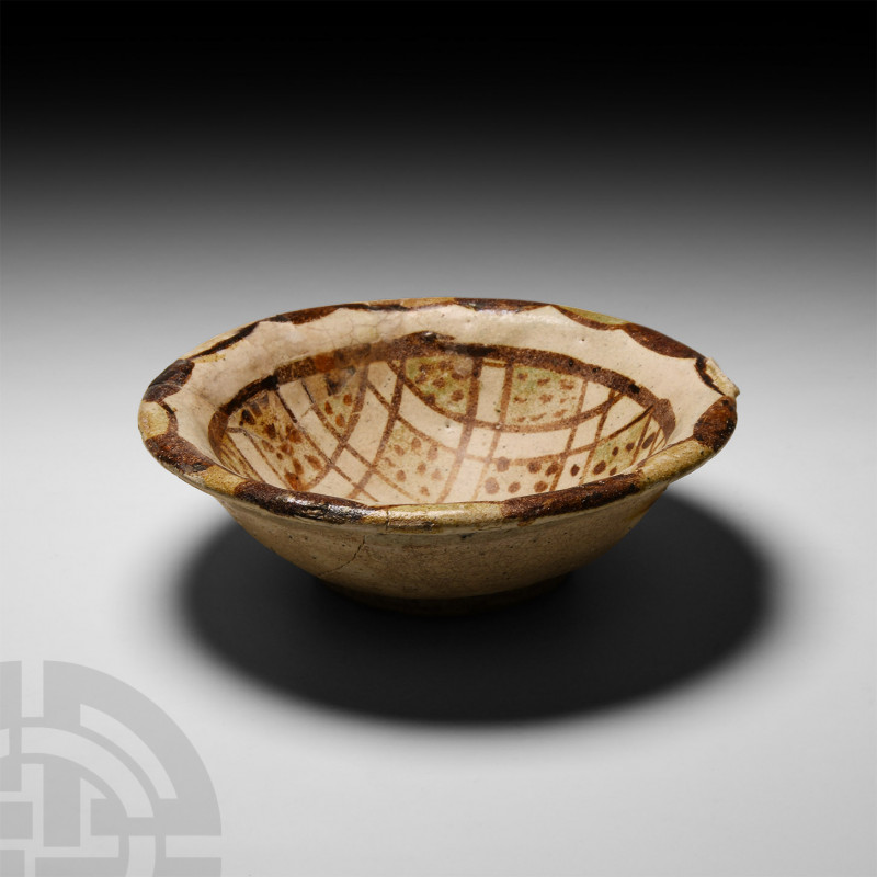 Abbasid Decorated Bowl 11th-12th century A.D. A ceramic bowl with tapering walls...