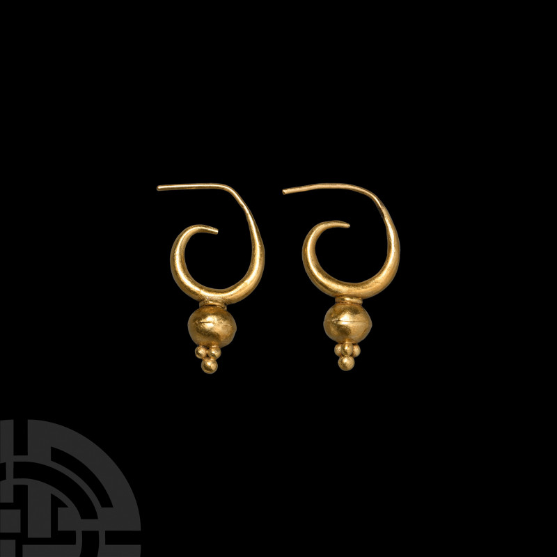 Gold Earring Pair 1st millennium B.C. A matched pair of gold earrings, each comp...