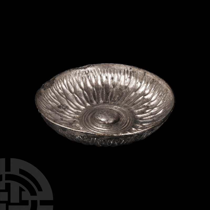 Elamite Silver Phiale Mesomphalos Circa 9th century B.C. A silver phiale or bowl...