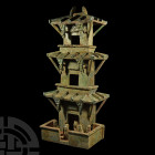 Chinese 'The Desmond Morris' Han Tower with Figures Han Dynasty, 206 B.C.-220 A.D. A glazed ceramic model tower in four separate tiers each with brace...
