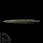 Large South Italic Socketted Spearhead Circa 18th-early 14th century B.C. A bronze spearhead with tapering D-section midrib to both faces and tapering...