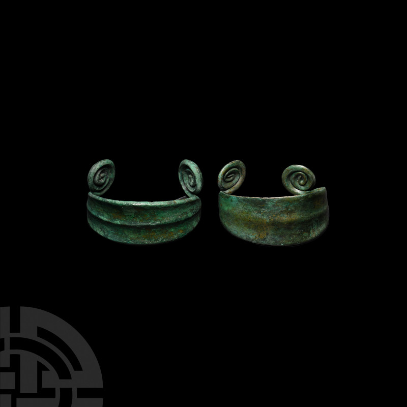 Bronze Age Coiled Bracelet Pair 1st millennium B.C. A matching pair of penannula...