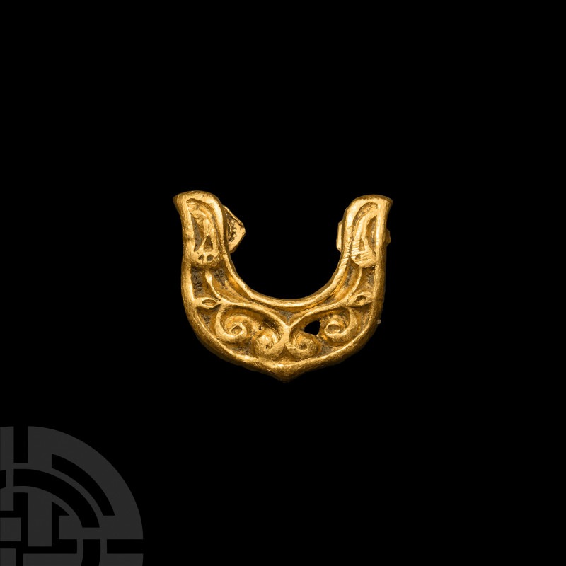 Avar Gold Horseshoe-Shaped Belt Mount 6th-7th century A.D. A gold belt hole-guar...