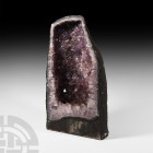 Giant Amethyst Cathedral Geode A spectacular free-standing amethyst crystal ‘cathedral’ geode, with flat base and prepared outer surface, with well-de...