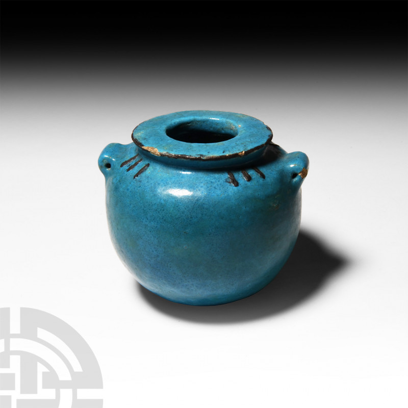 Egyptian Blue Glazed Faience Jar Ptolemaic Period, 332-30 B.C. A faience blue-gl...