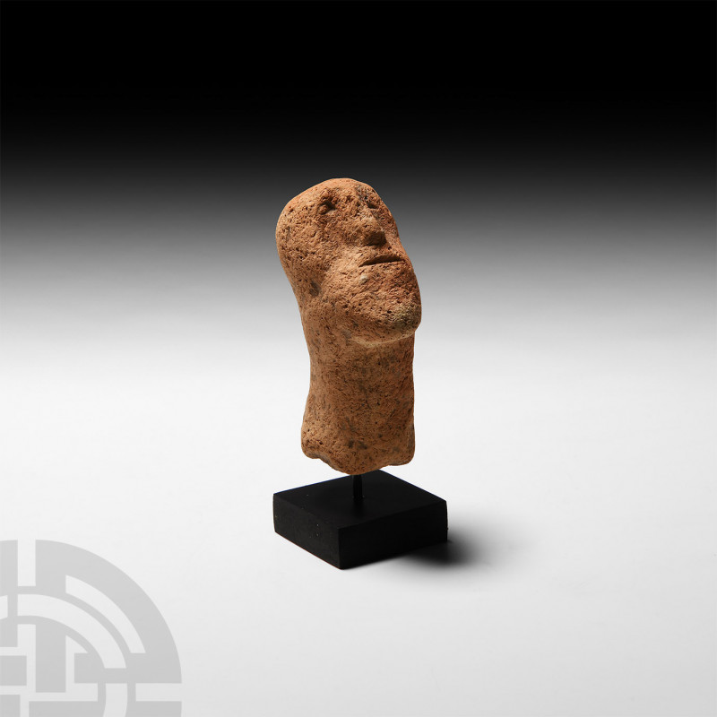 Mycenaean Terracotta Head 17th-12th century B.C. A terracotta head and neck with...