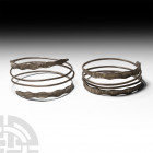 Graeco-Roman Silver Snake Bracelet Pair Circa 1st century B.C.-1st century A.D. A matching pair of silver bracelets or armlets formed as snakes, each ...