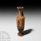 Greek Painted Lekythos Late 5th century B.C. A terracotta black-glaze lekythos (oil flask) with handle, a frieze of painted linked palmettes around th...