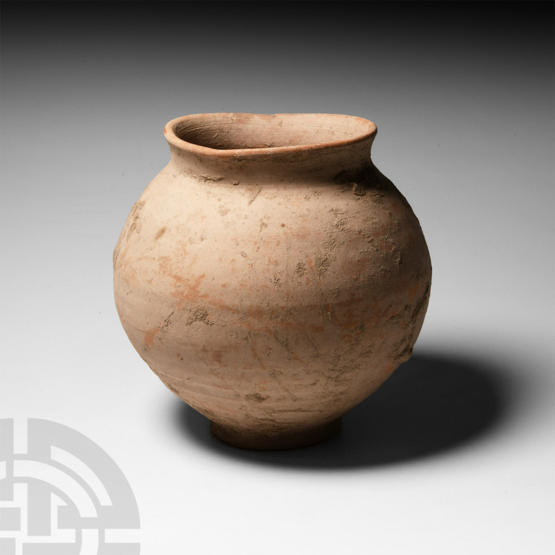 Roman Storage Jar 1st-4th century A.D. A bulbous ceramic storage jar with everte...