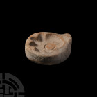 Roman Oil Lamp Mould 1st-2nd century A.D. A ceramic mould-half for the production of oil lamps with basal ring and five short nozzles. 742 grams, 13.1...