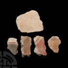 Roman Fresco Painted Wall Plaster Collection 1st century A.D. A mixed group of coarse white wall plaster fragments from a fresco, with painted designs...