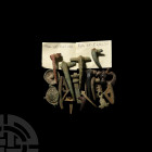 Roman Artefact Group Circa 1st-3rd century A.D. A mixed group of artefacts comprising casket mounts, toggle, pin, brooch and other fragments. 133 gram...