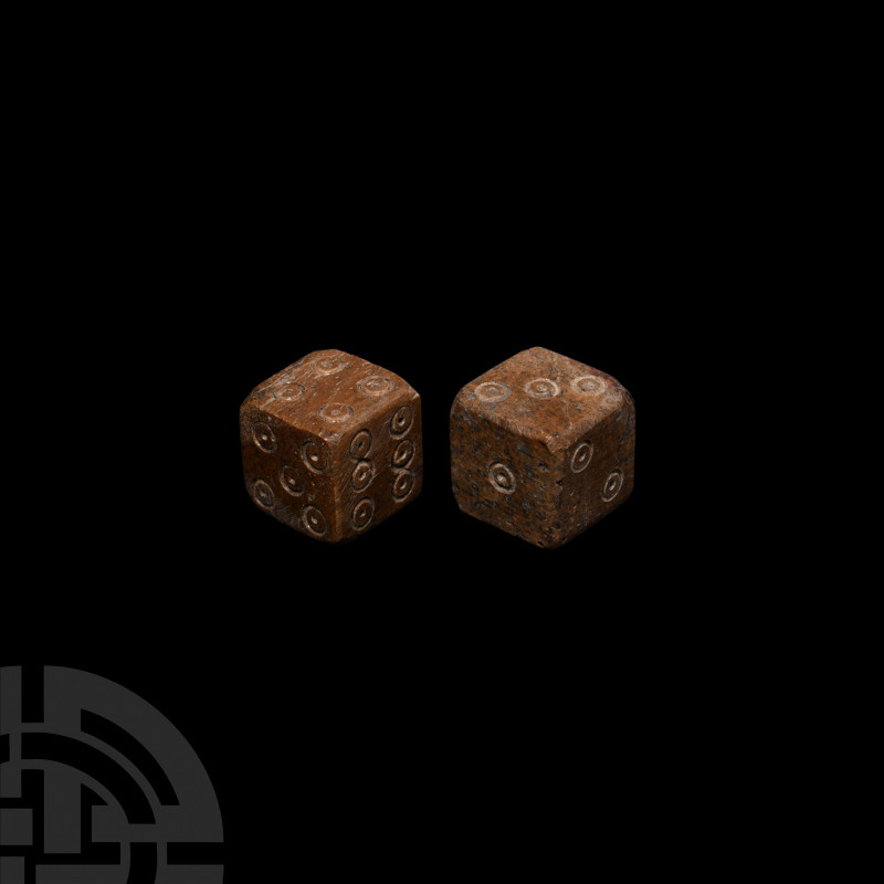 Roman Bone Dice Pair 1st-3rd century A.D. A pair of bone dice with ring-and-dot ...