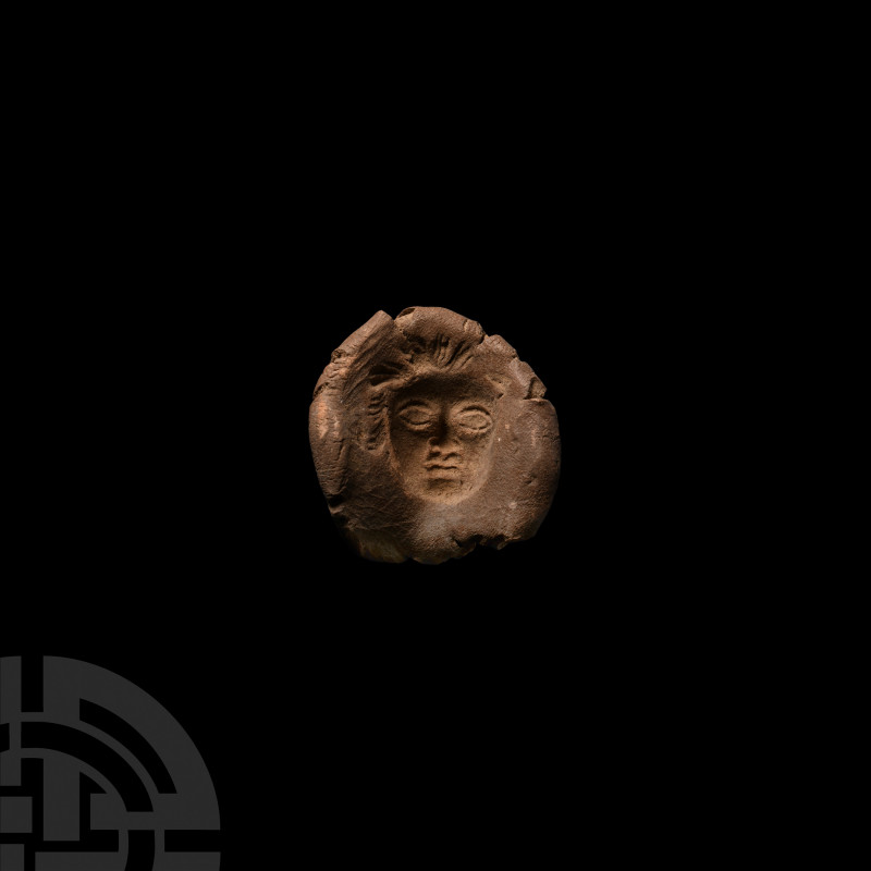 Roman Terracotta Face Mould 1st-2nd century A.D. A terracotta mould with domed p...