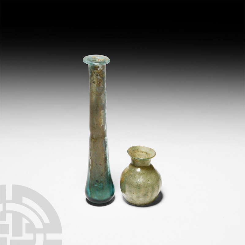 Roman Glass Vessel Group 1st-5th century A.D. A group of two glass vessels compr...