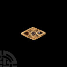 Byzantine Gold Garnet Set Necklace Clasp 13th-15th century A.D. A gold necklace clasp or other jewellery element, composed of a lozengiform body decor...