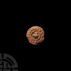 Byzantine Terracotta Stamp with Duck and Greek Inscription Circa 6th-7th century A.D. A terracotta discoid seal bearing a central stylised standing du...