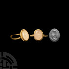 Byzantine Chalcedony Gemstone of Saint Nicholas in Gold Ring 11th-12th century A.D. A Byzantine chalcedony gemstone bearing intaglio bust of the nimba...