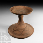 Bactrian Terracotta Chalice 3rd millennium B.C. A large terracotta chalice with shallow dish and splayed foot, polychrome geometric motifs to the foot...