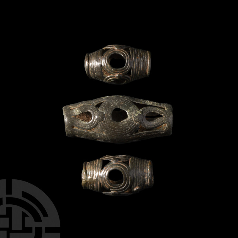 Amlash Cage Bead Collection 2nd-1st millennium B.C. A group of three bronze cage...