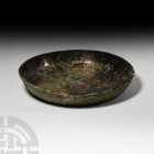 Luristan Platter 13th-6th century B.C. A copper-alloy platter or shallow bowl with tapering walls and flat rim. 777 grams, 25.5 cm diameter (10 in.). ...