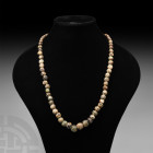 Western Asiatic Mosaic Bead Necklace 20th century A.D. or earlier. A restrung necklace composed of mosaic glass beads of various sizes and colours. 82...