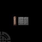Mesopotamian Cylinder Seal with Scorpions and Birds Mid 2nd millennium B.C. A steatite cylinder seal with a double register, the top register with adv...