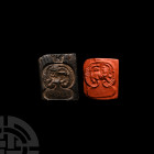 Bifacial Sun and Lion Mould Circa 12th century A.D. or later. A bifacial rectangular stone mould bearing an incuse stylised lion enclosed by a lunate ...