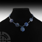 Lapis Lazuli Bead Necklace 20th century A.D. or earlier. A restrung necklace composed of lapis lazuli beads of different types. 31.1 grams, 43 cm long...