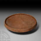 Ceramic Bowl Circa 2nd millennium B.C. A terracotta bowl with a truncated conical body and inverted rim. 1.06 kg, 23.5 cm diameter (9 1/4 in.). Acquir...