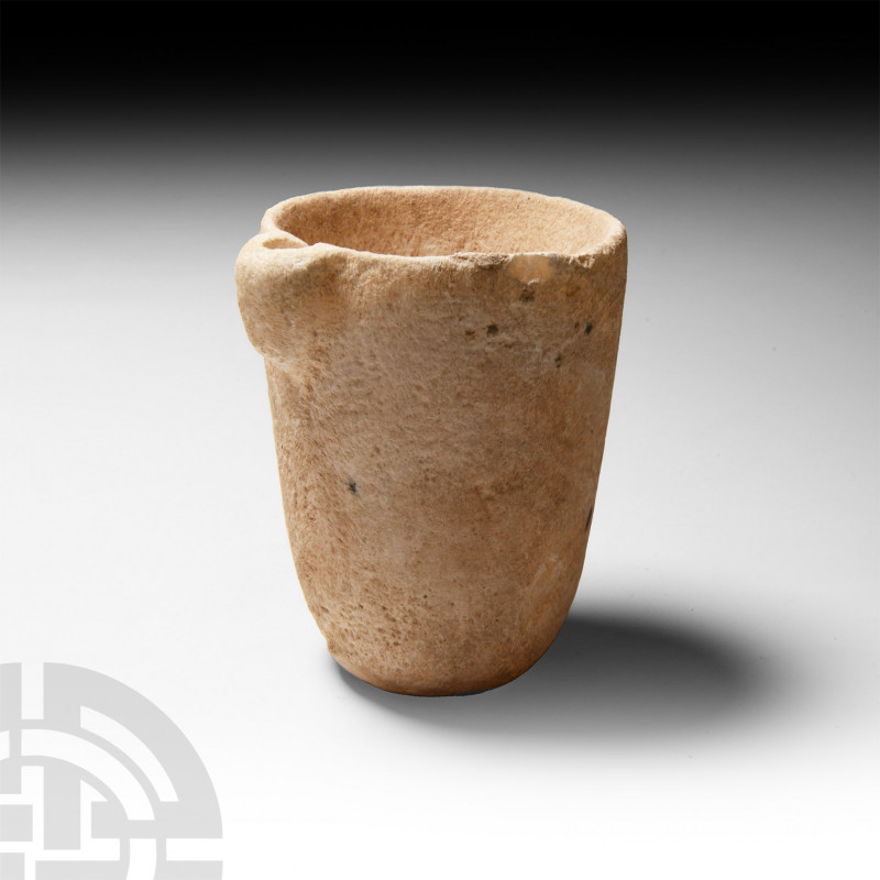 Mesopotamian Ritual Stone Cup Circa 1st millennium B.C. A deep U-shaped stone cu...