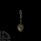 Western Asiatic Hinged Spoon 14th-15th century A.D. A copper-alloy spoon composed of an inverted fig-shaped bowl, decorated with enigmatic geometric f...