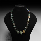 Western Asiatic Facetted Bead Necklace 19th century A.D. and earlier. A restrung necklace composed of graduated and facetted stone beads interspersed ...