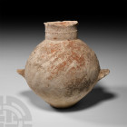 Holy Land Jar with Ledge Handles 4th-3rd millennium B.C. An early Bronze Age (phase 1) globular unglazed ceramic jar with broad neck decorated with a ...
