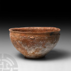 Holy Land Decorated Terracotta Bowl Bronze Age, 3rd millennium B.C. A terracotta bowl with carinated body and everted rim, four small lugs to the neck...