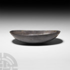 Sassanian Silver Boat-Shaped Vessel 3rd-7th century A.D. A silver boat-shaped bowl with U-section body. 304 grams, 22.5 cm wide (8 3/4 in.). London ar...