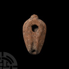 Holy Land Terracotta Slipper Lamp 4th-5th century A.D. A slipper-shaped terracotta oil lamp with oval filling hole and circular spout, shallow U-shape...