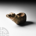 Western Asiatic Bull Offering Lamp 1st millennium B.C. A bronze oil lamp formed as a bull with its legs trussed beneath the body and neck extended; la...