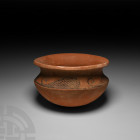 Western Asiatic Painted Terracotta Bowl 3rd-2nd millennium B.C. A squat terracotta bowl with rounded underside, carinated shoulder and everted flat ri...