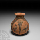 Painted Terracotta Vase with Crested Birds 3rd-2nd millennium B.C. A terracotta jar with rounded underside and trumpet-shaped mouth; painted bands to ...