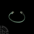 Western Asiatic Bracelet with Beast-Head Terminals 1st millennium B.C. A penannular bracelet with D-section body and terminals formed as beast heads. ...