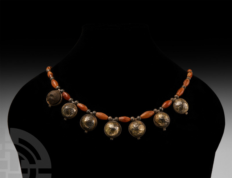 Elamite Necklace with Gilt Silver Pendants 2nd millennium B.C. A restrung neckla...